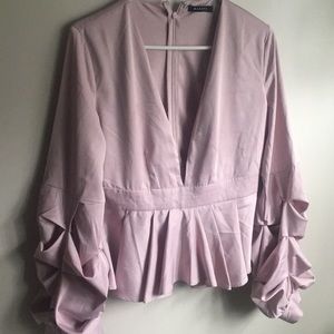 Peplum long sleeved blouse